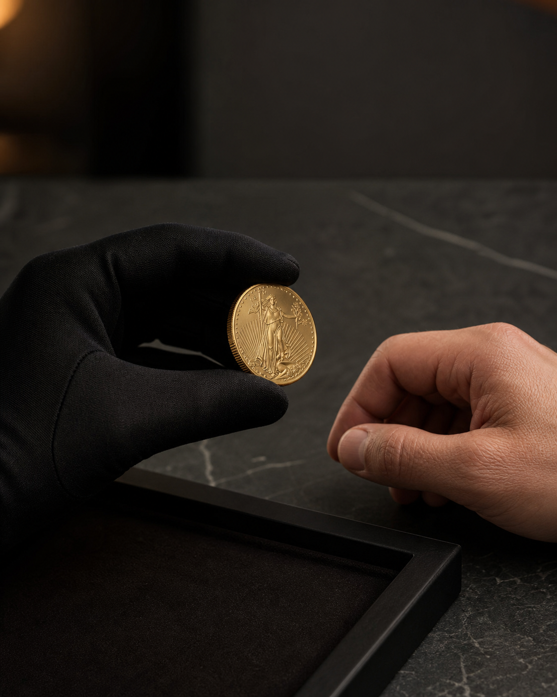 A precious-metals specialist presenting a gold coin during a private consultation